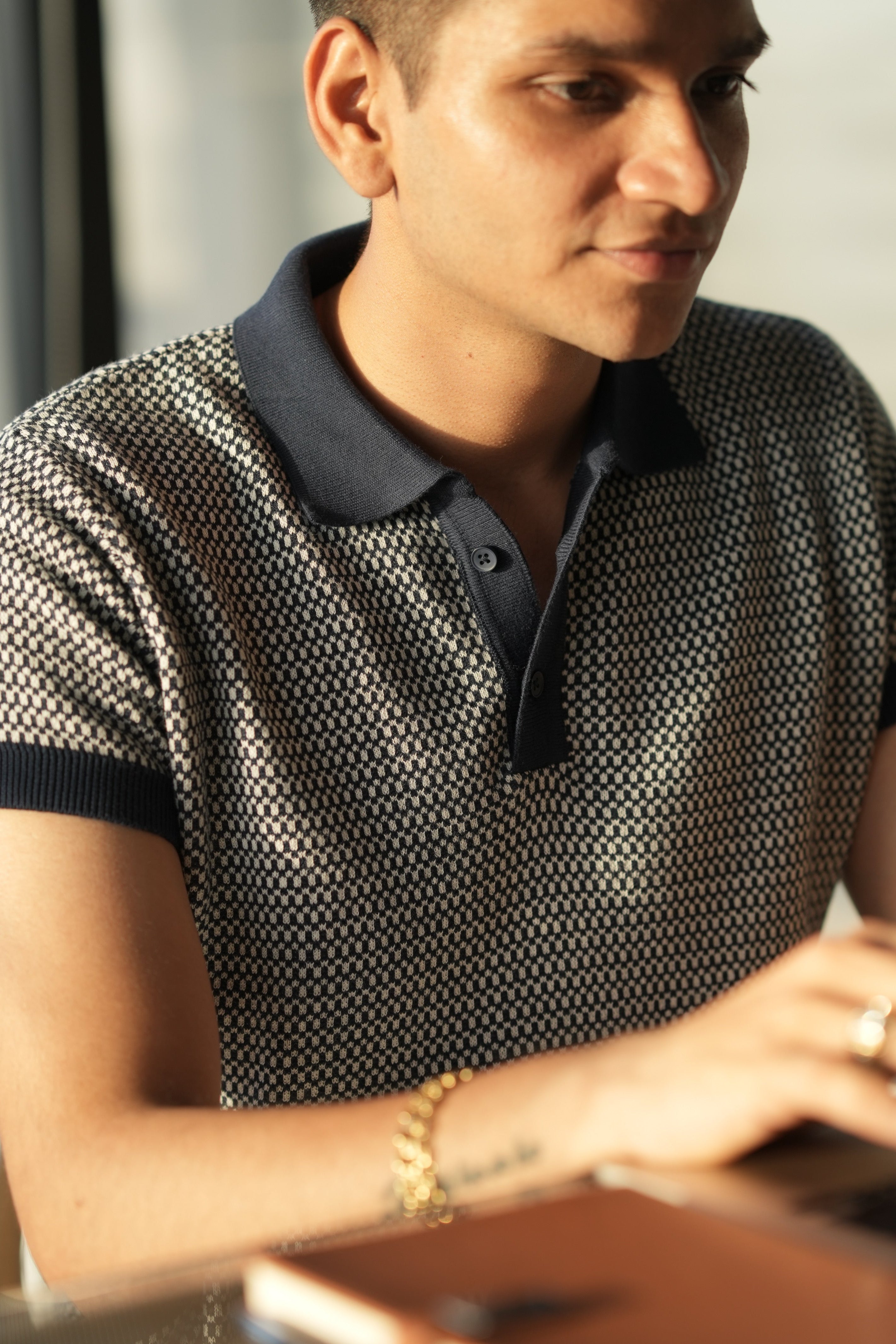 The Atelier Micro Knit Polo in Navy